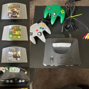 Nintendo 64 with 2 Controllers, 4 Games, Power and RCA cords.